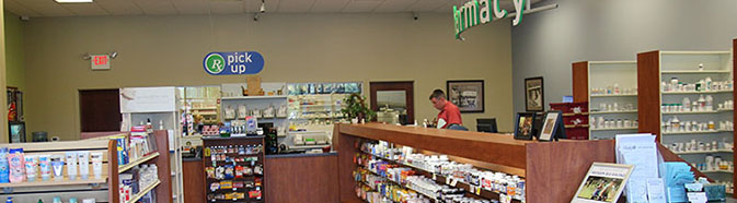 A photo inside of a pharmacy with good signage for marketing
